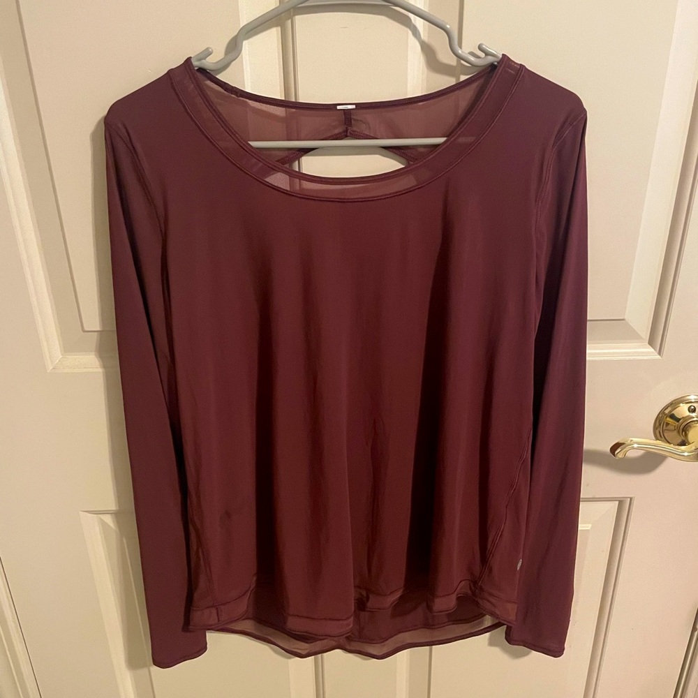 Lululemon. Size 8. Open back long sleeve shirt.